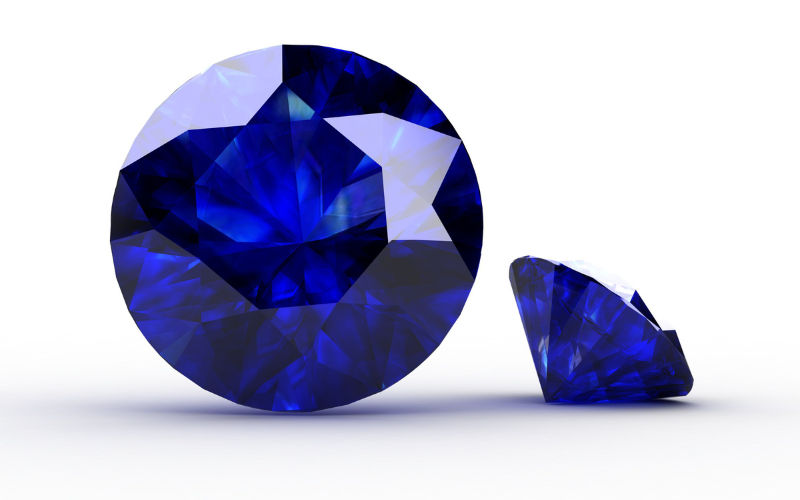 Vista aproximada de duas pedras safira na cor azul